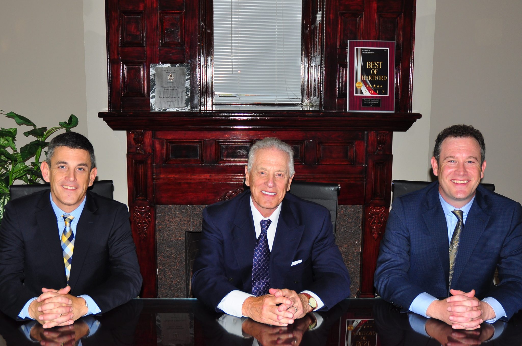Keith, Vincent and Scott Trantolo at boardroom table