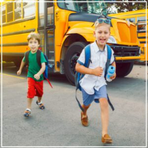 kids running from bus stop