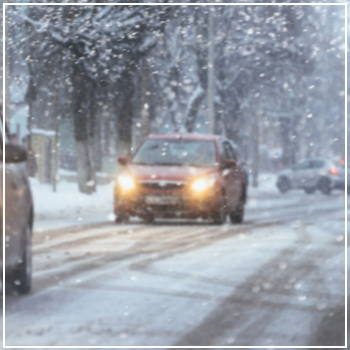 cars in a snowstorm